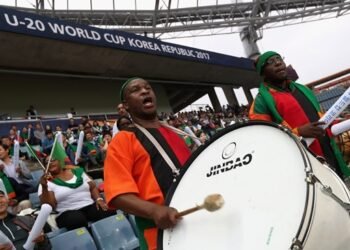 Peter-Makembo Drumming during a game