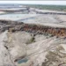 This image taken from video Feb. 19, 2025, shows a breach at a tailing dam at a Sino-Metals Leach Zambia mine near Kitwe. | Richard Kille/AP