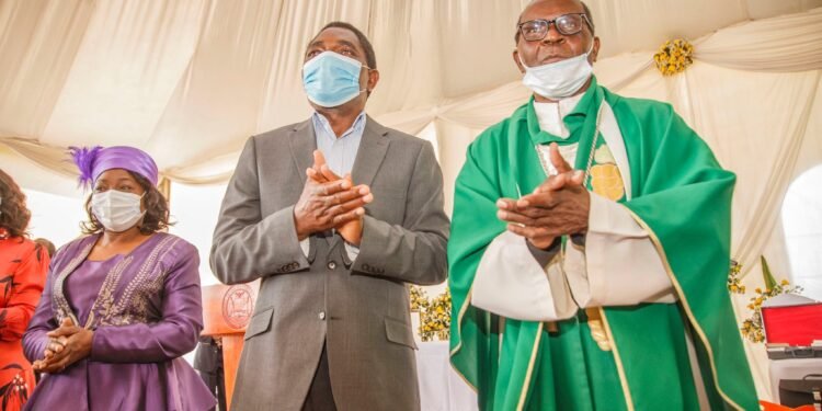 Archbishop Mpundu with Hichilema.